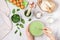 Woman prepares dough for homemade green pancakes for Breakfast. Whisk for whipping in hands