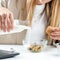 Woman Prepares Yogurt Muesli at Work