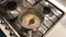 Woman preparing cream for cake in the kitchen homemade cheesecake