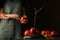 Woman preparing ripe apples for caramelizing at table
