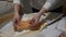 Woman is preparing a savoury cake with salmon slices FDV