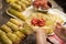 Woman preparing stuffed cabbage rolls