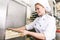 Woman preparing sweet croissants