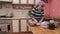 Woman Preparing Vareniki Dumplings, Pierogi On Wooden Bord For Boiling. Cook Prepare Traditional Ukrainian Cuisine