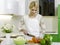 Woman preparing vegetarian salad