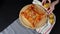 Woman prepping meal scene for a shoot on a wooden board