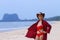 Woman pretty outdoor with hat red bikini on beach