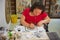 Woman produces stone mosaic in a workshop in Madaba, Jordan.