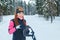 Woman professional cross-country classic Nordic skiing resting