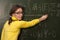 Woman professor teacher student chalk board