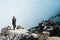 Woman in protective mask on active volcano Kawah Ijen