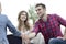 Woman psychologist greets the customer before the beginning of the family session.