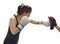 Woman punching boxing pad