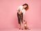 woman with puppy American Staffordshire Terrier posing in studio