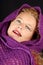 Woman with purple woolen scarf