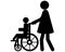 Woman pushes wheel chair with child
