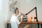 Woman radio host recording podcast at home studio