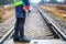 Woman railway employee with wrenches