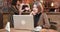 Woman reading very careful and focused an important message at her laptop