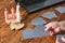 a woman reads cards in front of a computer, candles, a laptop, playing cards,, fortune telling on the Internet