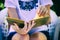 Woman reads an old book in leather binding