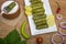 Woman ready to eat grape leaves stuffed rolls