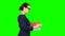 Woman received a gift and is glad. Green Screen. Side view