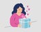 Woman receives a gift with love, she opens a birthday surprise. Concept of women\\\'s, valentine\\\'s, mother\\\'s day