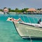 Woman in red bikini lying on boat bow