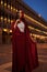 Woman in red cloak in Venice