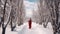 A Woman in red dress walking on a path in Winter landscape with fair trees under the snow. Scenery for the tourists. Christmas