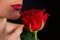 Woman red lips and rose