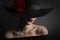 Woman Red Lips and Rose Flower in Black Hat, Beauty Fashion Model