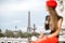 Woman in red traveling Paris