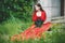 Woman in red Victorian dress