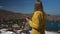 Woman with red wine on the balcony.