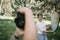 Woman with reflector in her hands having a photo session