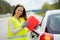 Woman refuelling her car