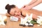 woman relaxing beeing massaged in spa saloon