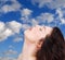 Woman relaxing blue sky