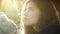 Woman relaxing and enjoying the sun in a summer park at sunset. Media. Close up of female beautiful face under the