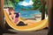 Woman Relaxing on a Hammock