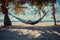 Woman relaxing in hammock on tropical beach