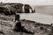 Woman relaxing and looking at the splendid Etretat