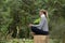 Woman relaxing meditation in a Forest