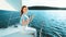 Woman Relaxing On Yacht Posing Sitting On Boat Deck Outdoor