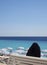 woman in religious shround hijab overlooking beach Prome