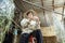 Woman removing fish from nets.