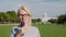 Woman reporter talking in front of US Capitol building