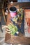 Woman repotting Pachypodium cactus to new pot